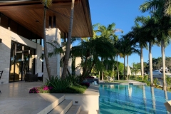 Luxury-Outdoor-Living-area-with-cumaru-ceilings-and-view-of-pool