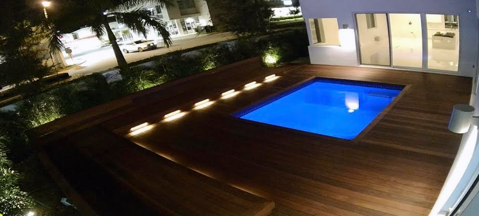 Cumaru Deck at Night With Blue Pool
